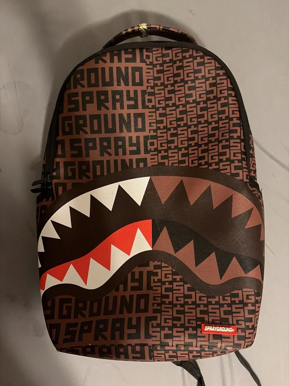 Sprayground Brown Shark-Mouth Logo Backpack with Red & White Accent